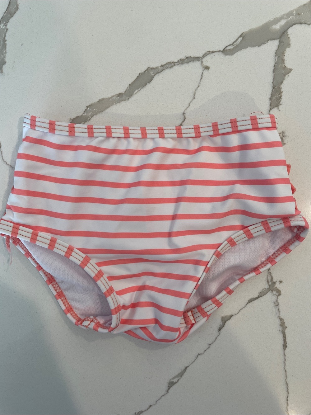 Ruffle Butts Coral and White Striped Kids Swim Trunks